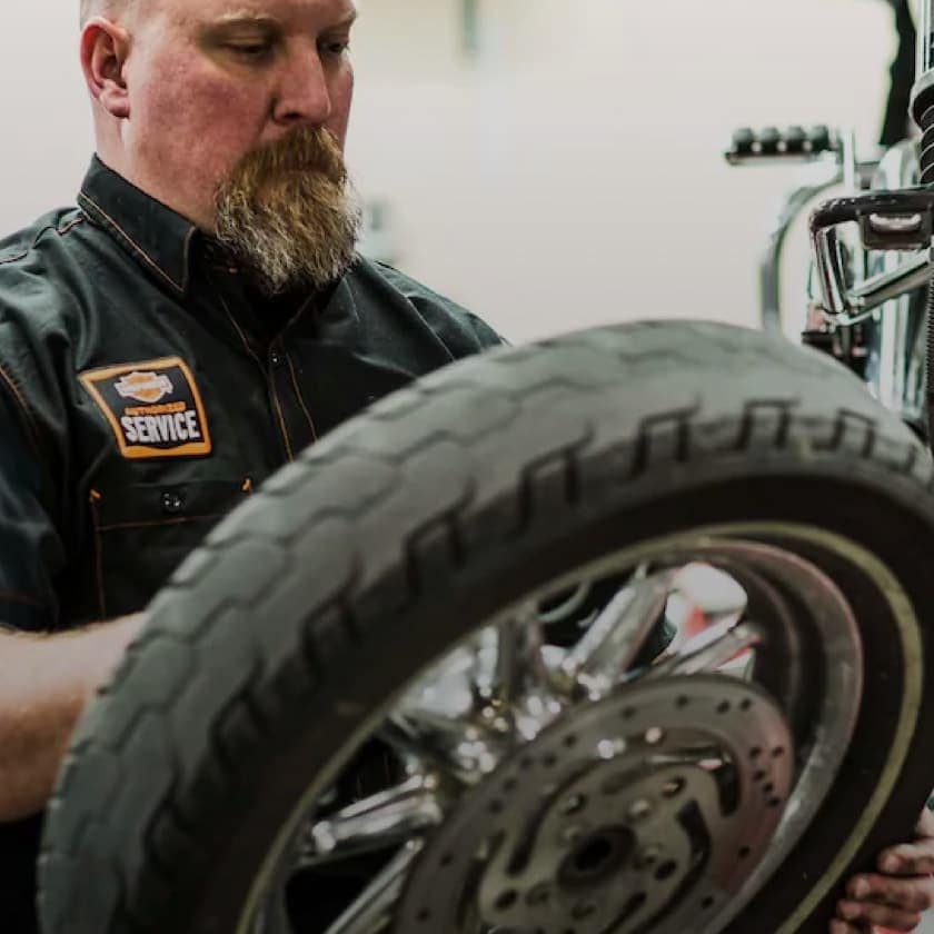 Mechanic Fixing Harley® Bike